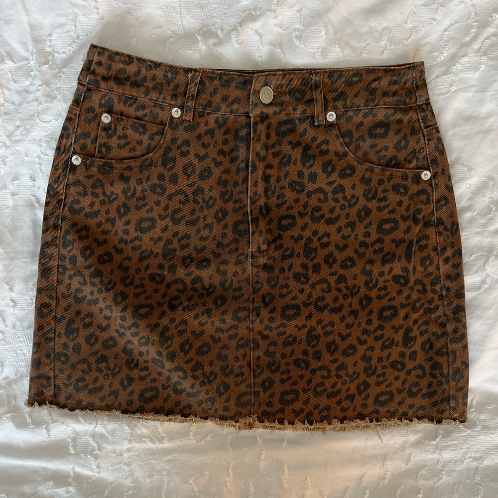 Mini skirt/printed jean skirt — Cheetah printed — Size Small